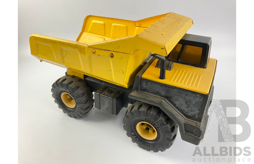 Three Pressed Steel Tonka Trucks and Tractor