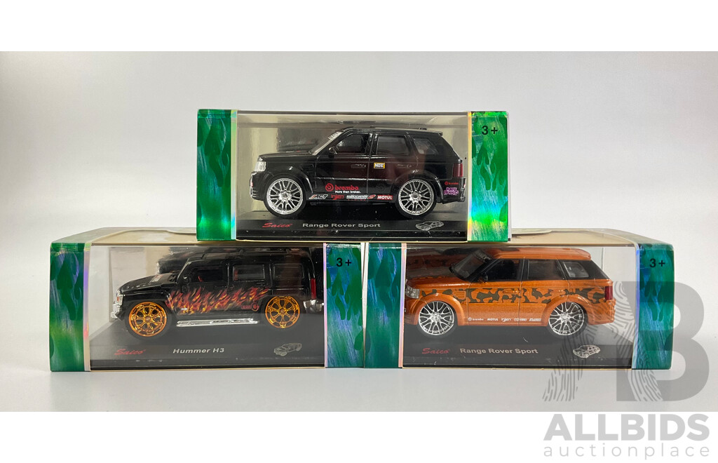 Three Boxed Diecast Saico Tuners Custom Machines Including Range Rover Sport, Hummer H3 - 1:43 Scale