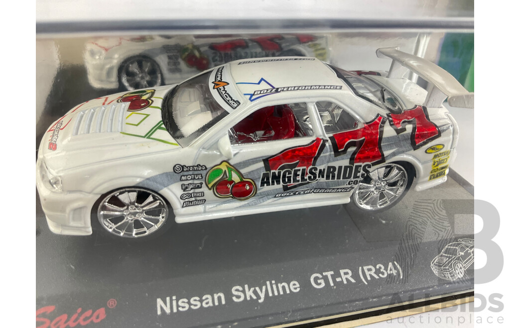 Four Boxed Diecast Saico Tuners Custom Machines Including Nissan Skyline GTR R34 and Subaru Impreza WRX STI - 1:43 Scale