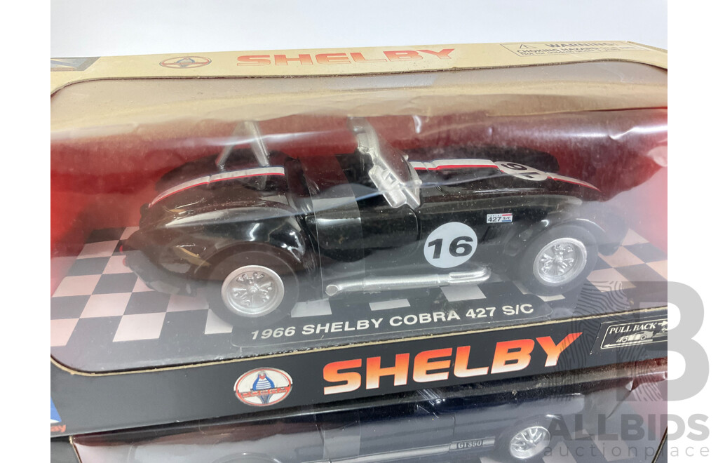 Four Boxed Diecast Newray Performance Vehicles Including 1966 Shelby Cobra 427 S/C, 1966 Shelby GT350, Mercedes Benz SLR Mclaren, BMW M8 - 1:32 Scale