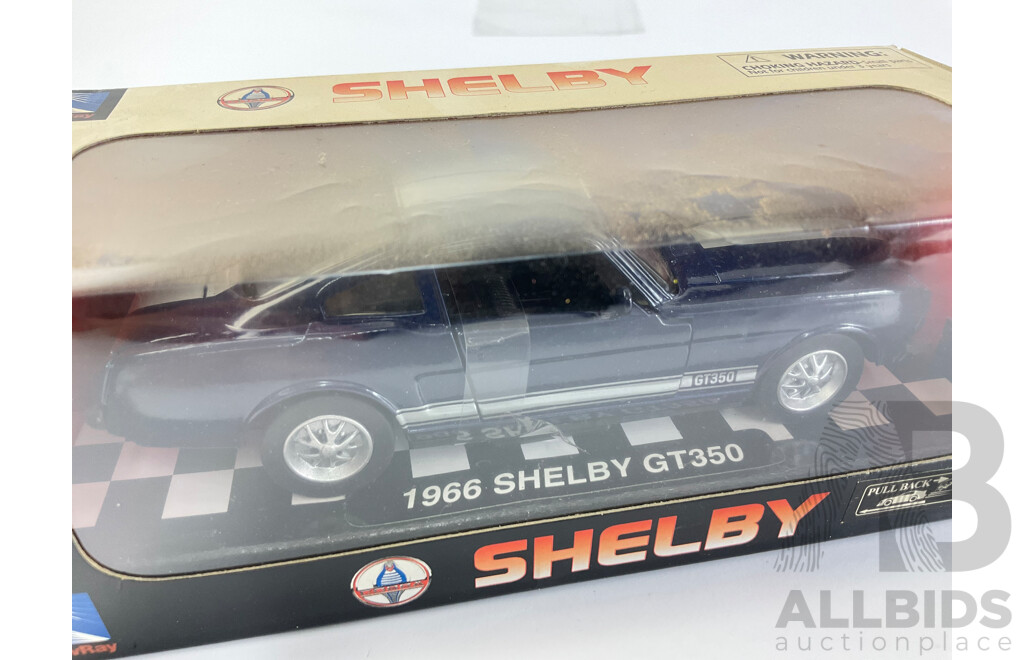 Four Boxed Diecast Newray Performance Vehicles Including 1966 Shelby Cobra 427 S/C, 1966 Shelby GT350, Mercedes Benz SLR Mclaren, BMW M8 - 1:32 Scale