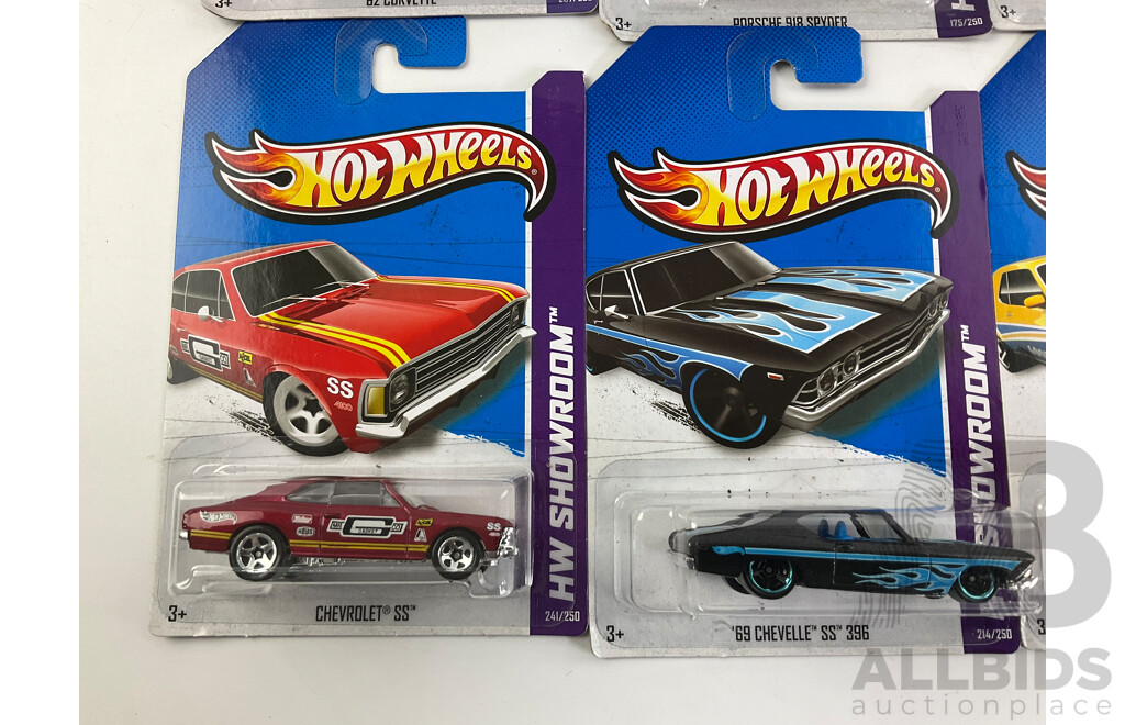 Ten Boxed Hot Wheels HW Showroom Vehicles Including Aston Martin DBS, 1968 Mercury Cyclone, 1964 Corvette Stingray