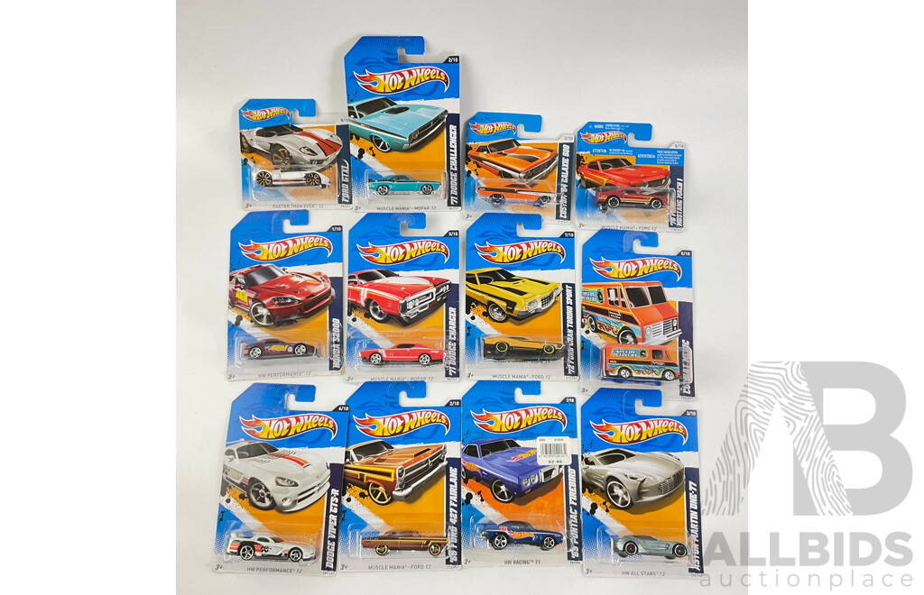 Twelve Boxed Hot Wheels Diecast Vehicles Including Muscle Mania and HW Performance 12