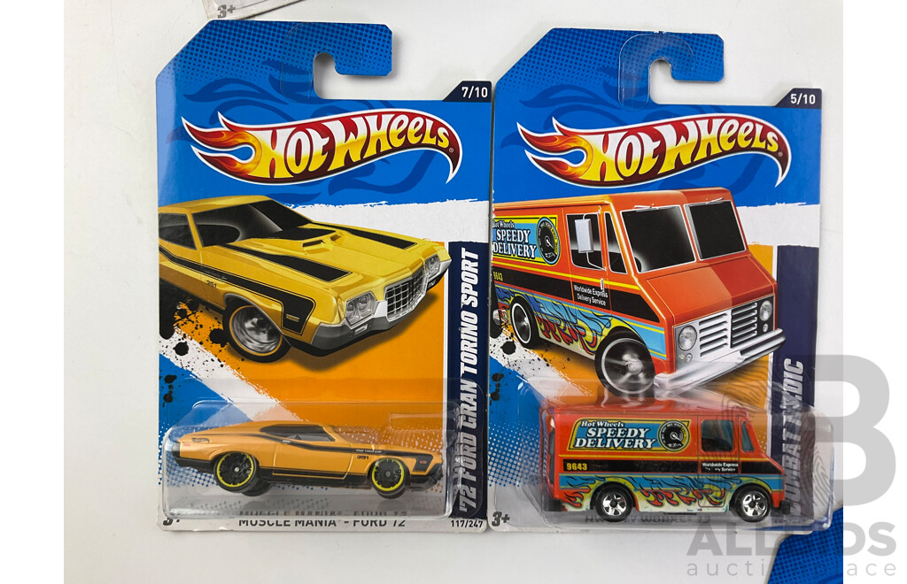 Twelve Boxed Hot Wheels Diecast Vehicles Including Muscle Mania and HW Performance 12