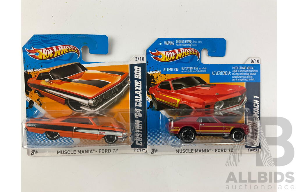 Twelve Boxed Hot Wheels Diecast Vehicles Including Muscle Mania and HW Performance 12