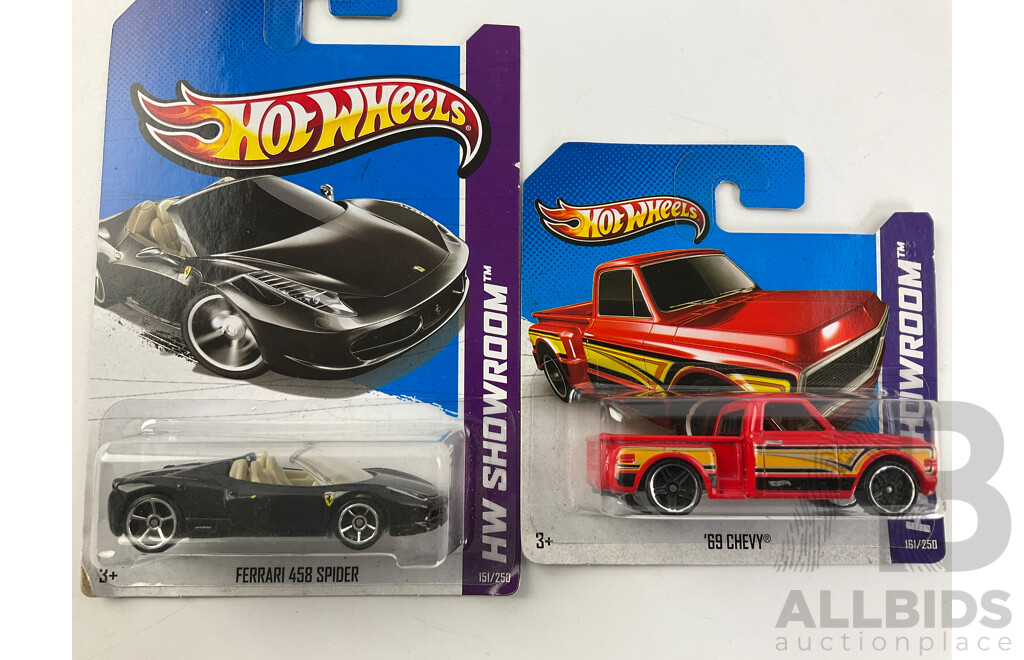 Twelve Boxed Hot Wheels HW Showroom Vehicles Including Shoe Box, 80's Corvette, 70 Hemi Cuda