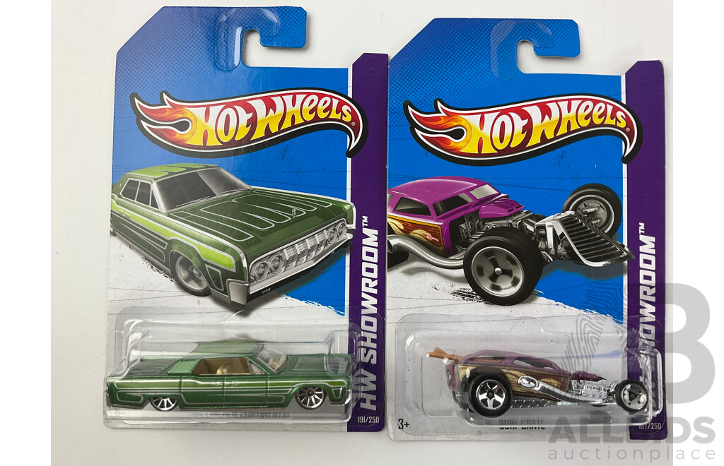 Twelve Boxed Hot Wheels HW Showroom Vehicles Including Shoe Box, 80's Corvette, 70 Hemi Cuda