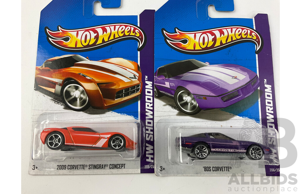 Twelve Boxed Hot Wheels HW Showroom Vehicles Including Shoe Box, 80's Corvette, 70 Hemi Cuda