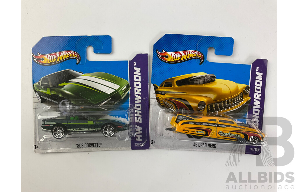 Twelve Boxed Hot Wheels HW Showroom Vehicles Including Shoe Box, 80's Corvette, 70 Hemi Cuda