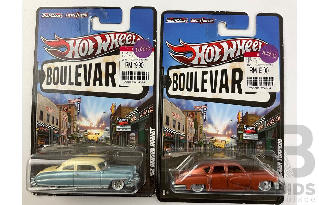 Thirteen Boxed Hot Wheels Diecast Vehicles Including 'The Hot Ones' and Boulevard