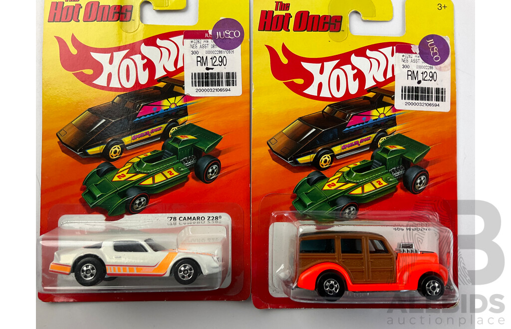 Thirteen Boxed Hot Wheels Diecast Vehicles Including 'The Hot Ones' and Boulevard