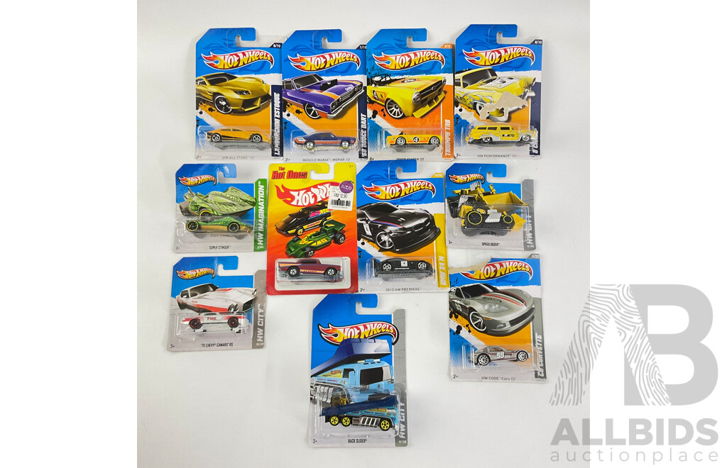 Twelve Boxed Hot Wheels Diecast Vehicles Including HW City, 'The Hot Ones' HW Imagination