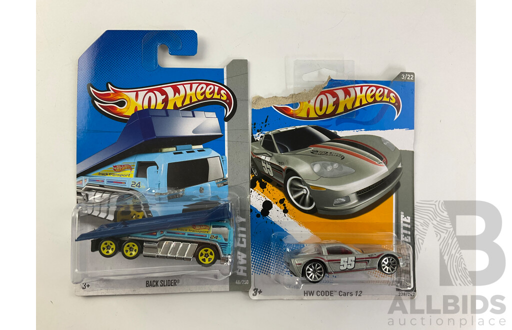 Twelve Boxed Hot Wheels Diecast Vehicles Including HW City, 'The Hot Ones' HW Imagination