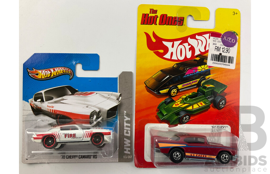 Twelve Boxed Hot Wheels Diecast Vehicles Including HW City, 'The Hot Ones' HW Imagination