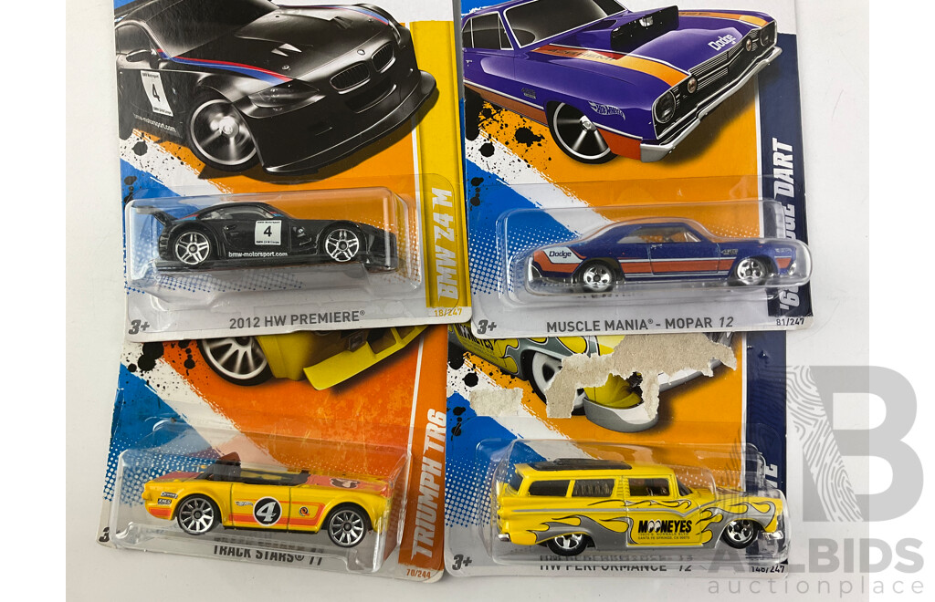 Twelve Boxed Hot Wheels Diecast Vehicles Including HW City, 'The Hot Ones' HW Imagination