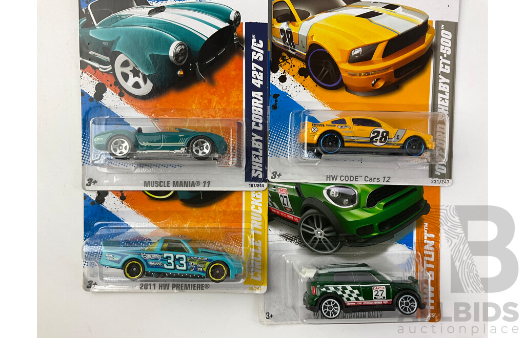 Sixteen Boxed Hot Wheels Diecast Vehicles Including HW City, HW Stunt, Tread Air