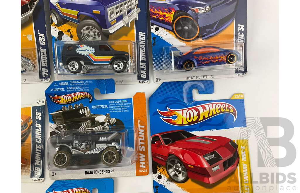 Twenty Boxed Hot Wheels Diecast Vehicles Including HW City, HW Stunt, HW Showroom, HW Imagination