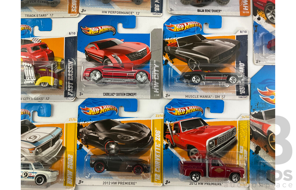 Twenty Boxed Hot Wheels Diecast Vehicles Including HW City, HW Stunt, HW Showroom, HW Imagination