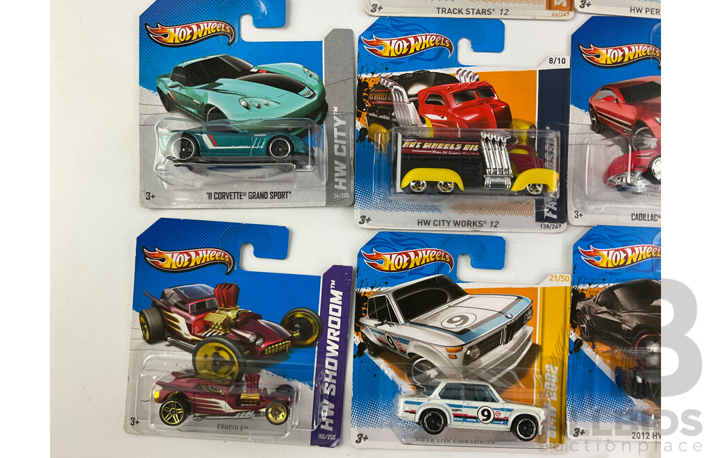 Twenty Boxed Hot Wheels Diecast Vehicles Including HW City, HW Stunt, HW Showroom, HW Imagination