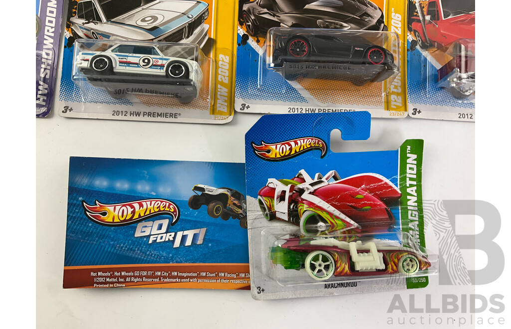 Twenty Boxed Hot Wheels Diecast Vehicles Including HW City, HW Stunt, HW Showroom, HW Imagination