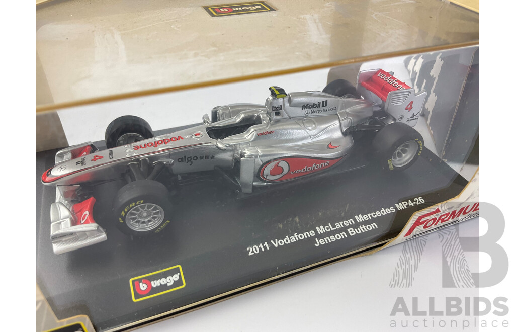 Assortment of Diecast Vehicles Including 1988 McLaren F! Ayrton Senna, Burago 2011 McLaren F1 Jenson Button, NASCAR Bashers, David Jones Trucks