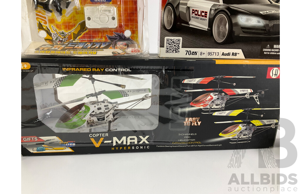 Assortment of Boxed Toys Including V-Max Hypersonic Helicopter, Mega Bloks Need for Speed, Flash Track Stars