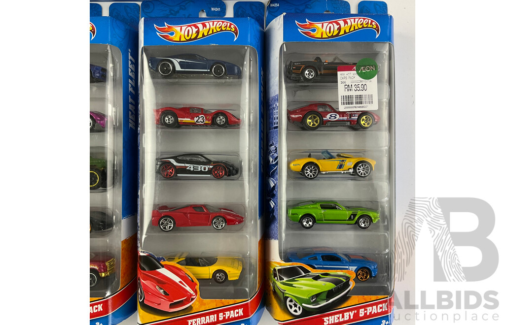 Nine Boxed Hot Wheels Five Packs Including Desert Race, Heat Fleet, Ferrari, Shelby, X-raycers, HW Exotics, Corvette, Wall Tracks