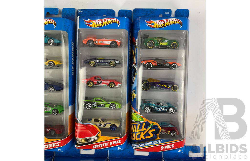 Nine Boxed Hot Wheels Five Packs Including Desert Race, Heat Fleet, Ferrari, Shelby, X-raycers, HW Exotics, Corvette, Wall Tracks