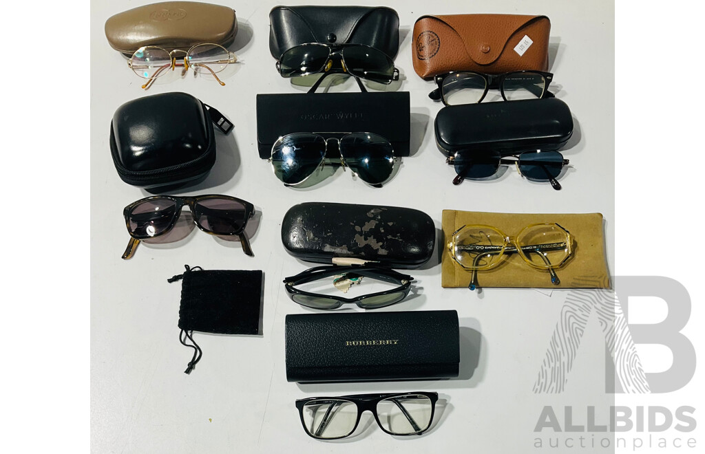 Collection of Sung,asses of Various Styles Including Examples Labeled as Gucci and Ray-ban