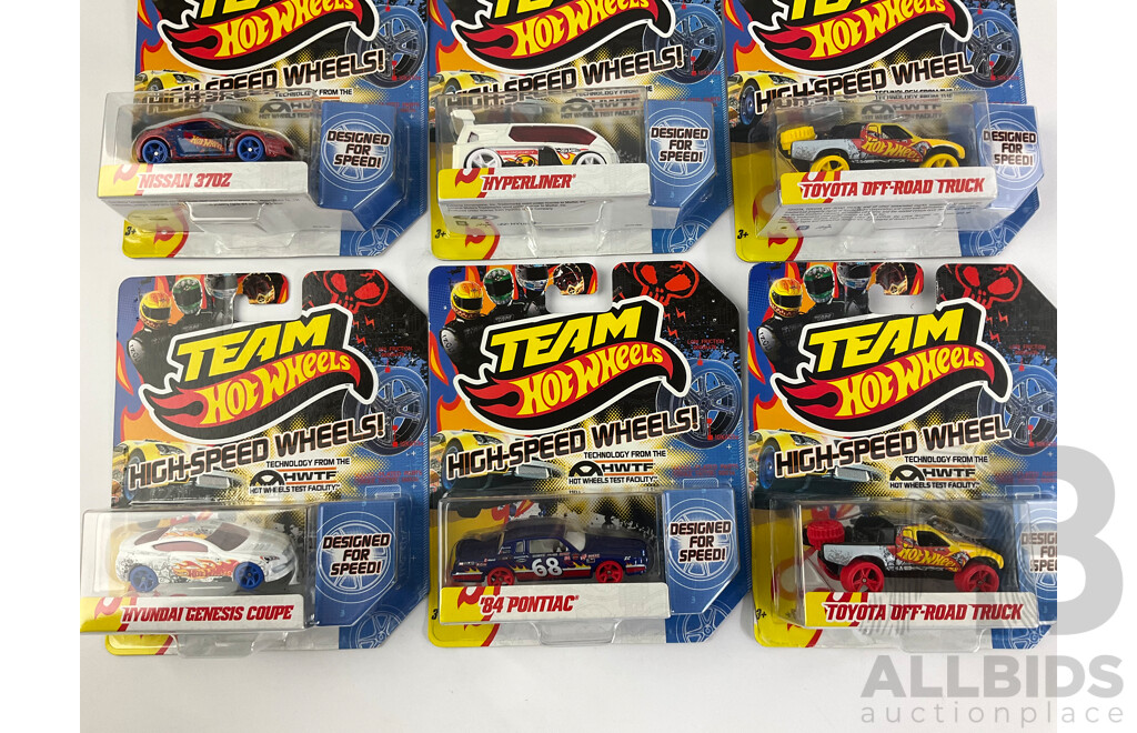 Nine Boxed Hot Wheels High Speed Wheels Including Stock Camaro, Sky Knife, Bad to the Blade, Nissan 370Z, Hyperliner, Toyota Off Road Truck, Hyundai Genesis Coupe, Pontiac