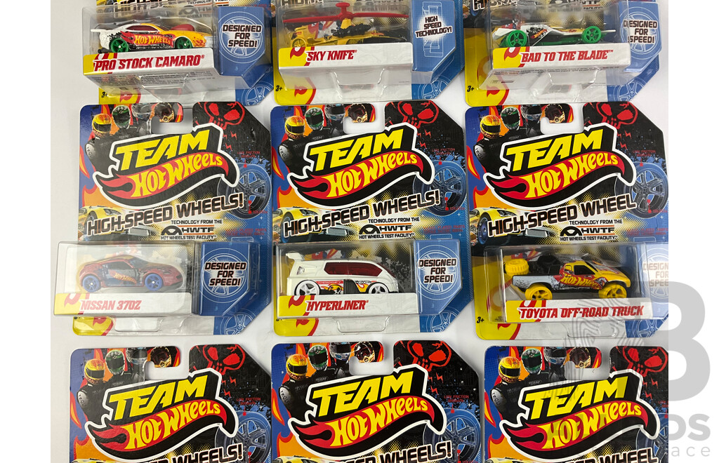 Nine Boxed Hot Wheels High Speed Wheels Including Stock Camaro, Sky Knife, Bad to the Blade, Nissan 370Z, Hyperliner, Toyota Off Road Truck, Hyundai Genesis Coupe, Pontiac