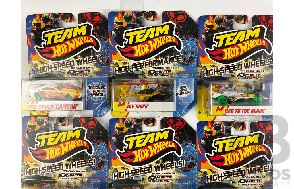 Nine Boxed Hot Wheels High Speed Wheels Including Stock Camaro, Sky Knife, Bad to the Blade, Nissan 370Z, Hyperliner, Toyota Off Road Truck, Hyundai Genesis Coupe, Pontiac