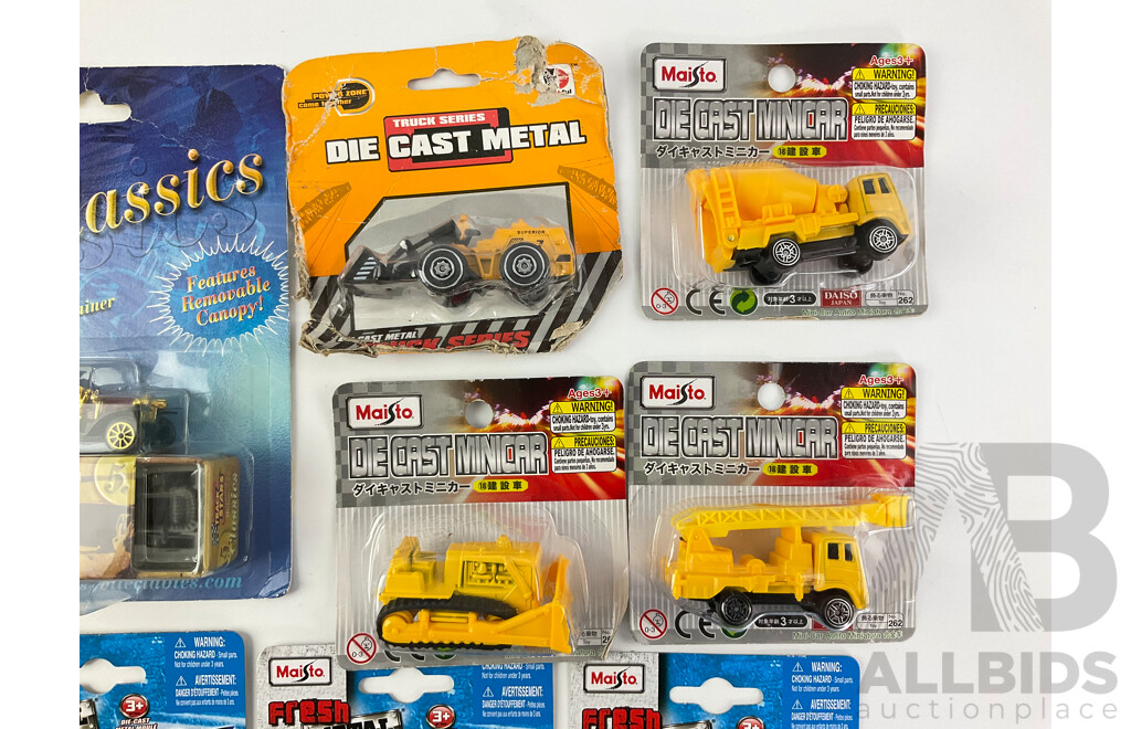 Collection of Boxed Diecast Cars and Construction Vehicles Including Maisto, Track Stars and Power Zone