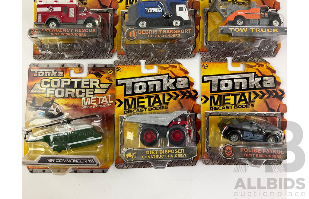 Ten Boxed Tonka Diecast Vehicles and Helicopters