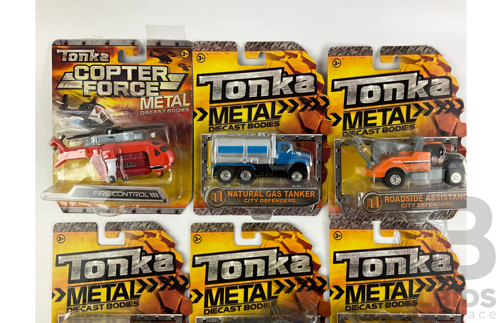 Ten Boxed Tonka Diecast Vehicles and Helicopters