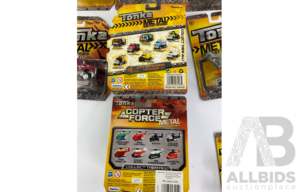 Ten Boxed Tonka Diecast Vehicles and Helicopters