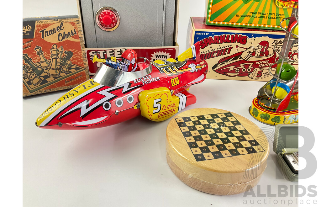 Collection of Vintage Style Toys Including Flash Gordon Rocket, Steel Safe, Yo-Yo, Travel Chess, Juggling Elephant, Harmonica with Original Boxes