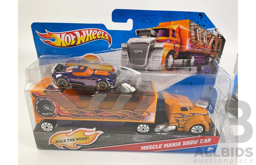 Three Boxed Hot Wheels Trucks Including Muscle Mania Show Car, Police Roll Patrol and Fright Freighter