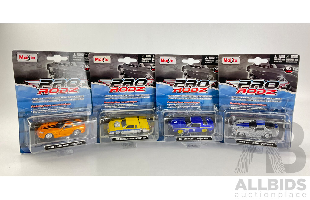 Four Boxed Diecast Maisto Pro Rodz Including 1986 Monte Carlo SS and 1971 Chevrolet Camaro Z/28 - 1:64 Scale