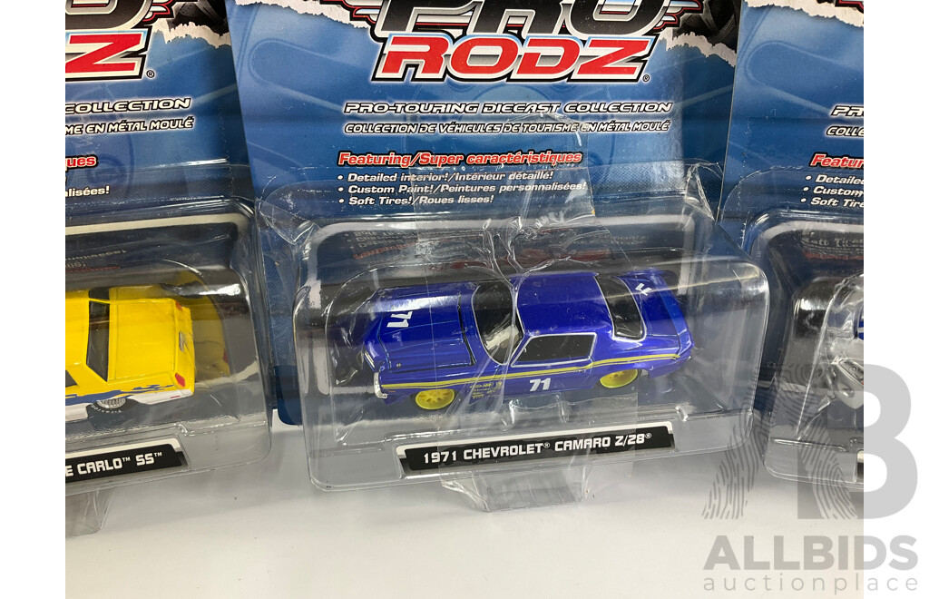 Four Boxed Diecast Maisto Pro Rodz Including 1986 Monte Carlo SS and 1971 Chevrolet Camaro Z/28 - 1:64 Scale