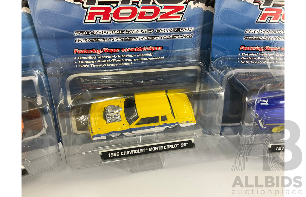 Four Boxed Diecast Maisto Pro Rodz Including 1986 Monte Carlo SS and 1971 Chevrolet Camaro Z/28 - 1:64 Scale