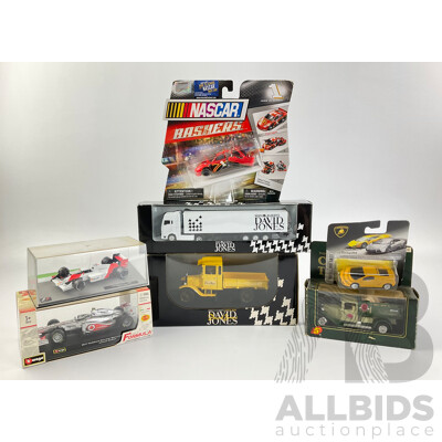 Assortment of Diecast Vehicles Including 1988 McLaren F! Ayrton Senna, Burago 2011 McLaren F1 Jenson Button, NASCAR Bashers, David Jones Trucks