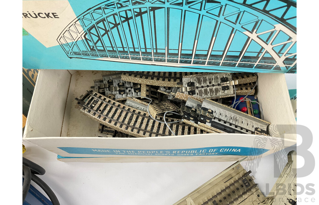 Collection of Vintage Marklin HO Scale Items Including Level Crossing, Power Transformer, Cross Over, Points, Signals, Arched Bridge, Girder Bridge, Track Straights and Curves with Original Boxes, Made in West Germany