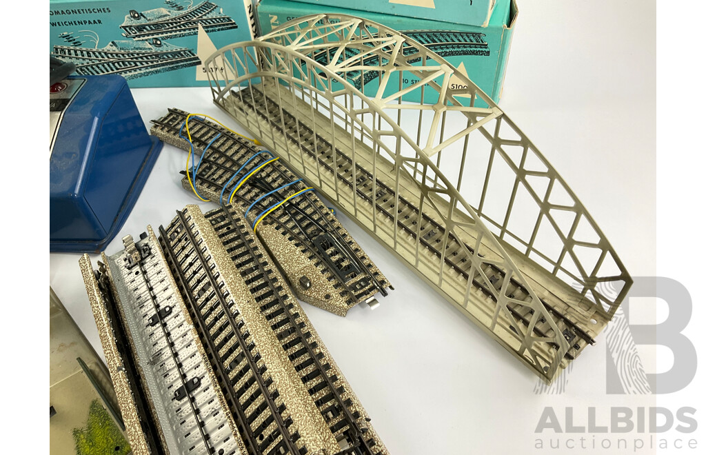 Collection of Vintage Marklin HO Scale Items Including Crossing, Girder Bridge, Arched Bridge, Points, Track Curves and Straights, Transformer with Original Boxes, Made in West Germany