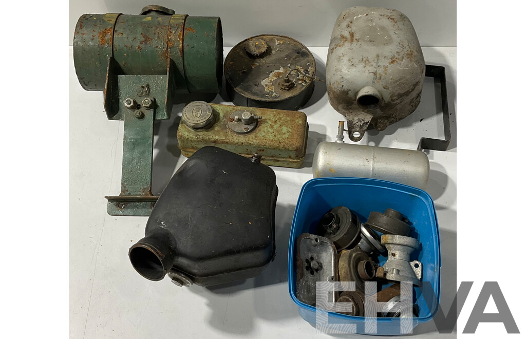 Collection of Vintage Lawn Mower Fuel Tanks and Other Accessories