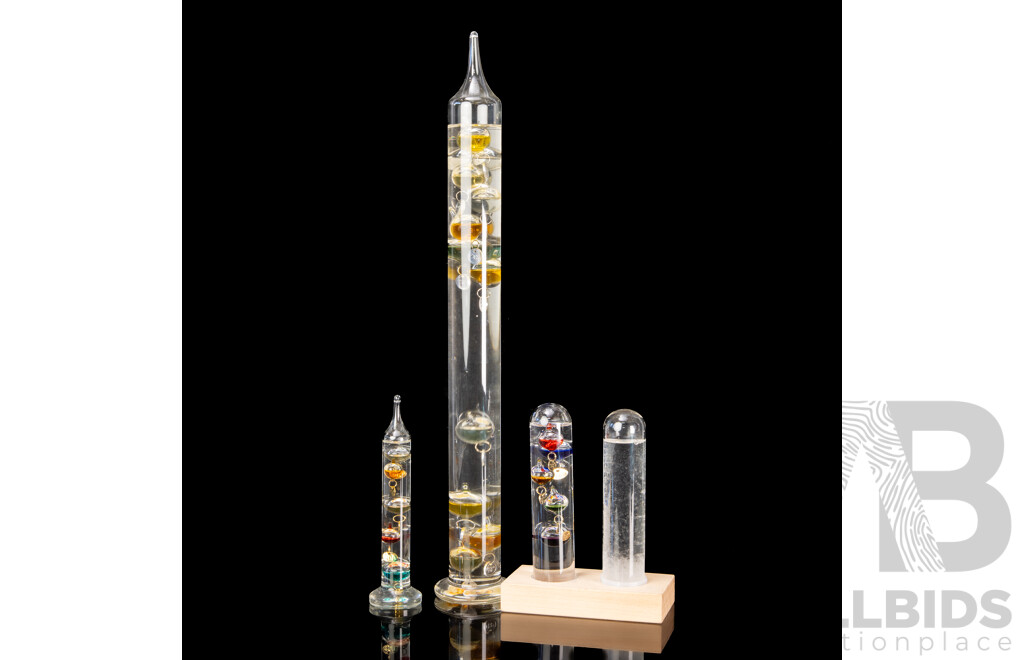 Collection Galileo Thermometers. One with Admiral Fitzroy Storm Glass