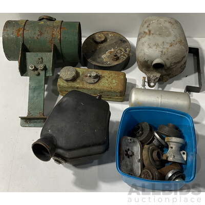 Collection of Vintage Lawn Mower Fuel Tanks and Other Accessories
