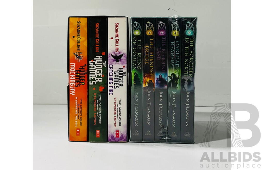 The Hunger Games, Suzanne Collins, Three Volume Soft Cover Set in Slip Case Along with Rangers Apprentice, John Flanagan, FIve Volume Soft Cover Set in Slip Case