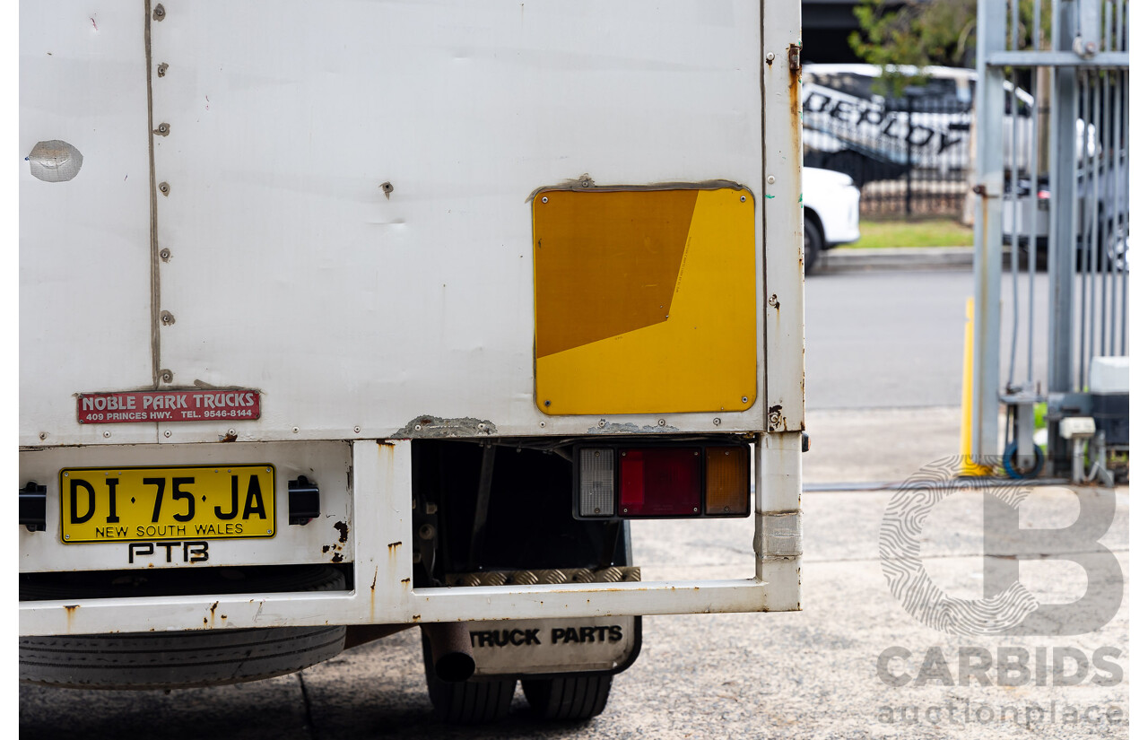 11/2009 Isuzu NPR200 Medium 4x2 NH C/Chas Curtain Side White Turbo Diesel 5.2L