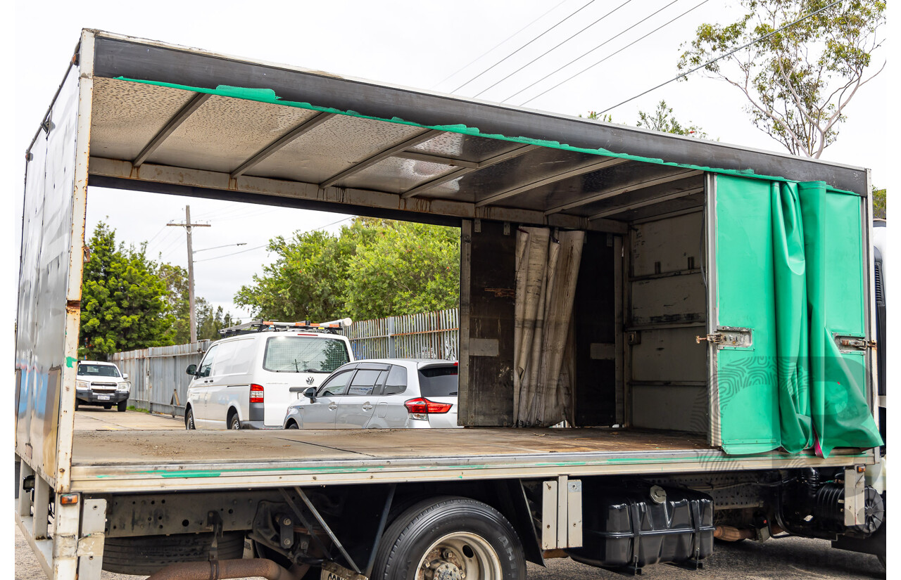 11/2009 Isuzu NPR200 Medium 4x2 NH C/Chas Curtain Side White Turbo Diesel 5.2L